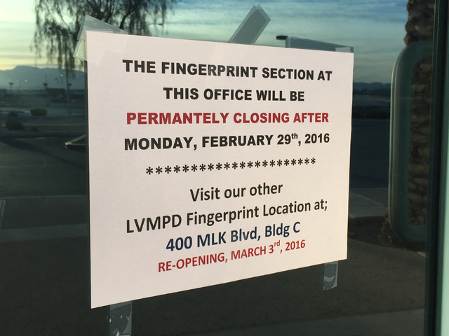A sign that reads the Metropolitan Police Department's fingerprint bureau in the south valley is now closed sits taped to the bureau''s front door on March 1, 2016. The bureau closed after Feb. 29 ...
