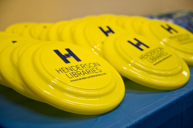 Frisbees branded with the new Henderson Libraries logo sit on a table at the Green Valley Library March 1. Daniel Clark/View