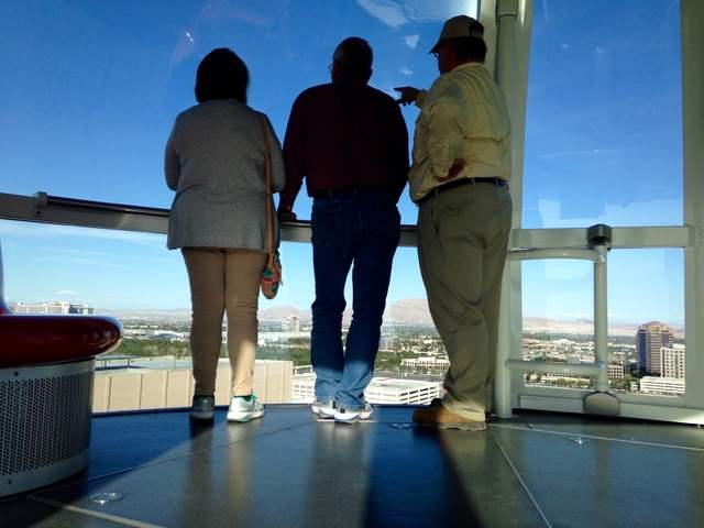 Pink Jeep tour guide Richard Evans points out landmarks from the High Roller to Gary and Peggy Hafernick during a tour of the Strip on Wednesday, March 8, 2016. Kimberly De La Cruz/Las Vegas Revie ...