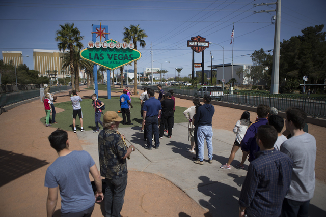 People line up to take photos at the Welcome to Fabulous Las Vegas sign on Tuesday, March 15, 2016, in Las Vegas. Erik Verduzco/Las Vegas Review-Journal Follow @Erik_Verduzco