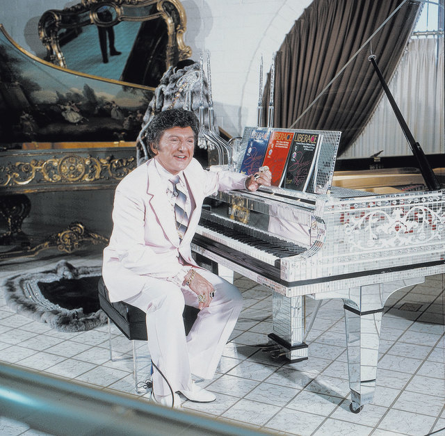 Liberace poses at a piano in his namesake museum at when it opened at 1775 E. Tropicana Ave. in 1979. (Courtesy/Las Vegas News Bureau)
