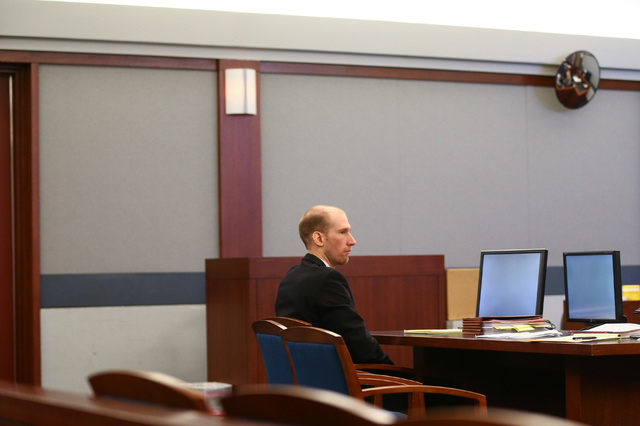 Jason Lofthouse looks on during his trial at the Regional Justice Center in Las Vegas on Tuesday, March 22, 2016. The former Rancho High School teacher faces charges of kidnapping and sexual condu ...