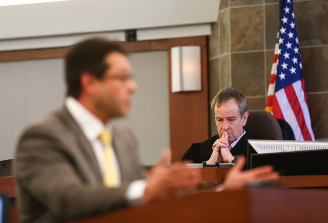 Judge Eric Johnson looks on as defense lawyer Dmitry Gurovich speaks during opening statements for the trial of Jason Lofthouse at the Regional Justice Center in Las Vegas on Tuesday, March 22, 20 ...