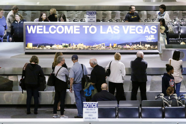 People wait to retrieve luggage at a Southwest Airlines baggage claim at McCarran International Airport Wednesday, March 23, 2016, in Las Vegas. Ronda Churchill/Las Vegas Review-Journal