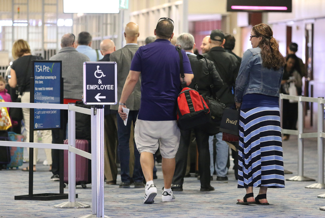 Passengers wait in line at McCarran International Airport security Wednesday, March 23, 2016, in Las Vegas. Ronda Churchill/Las Vegas Review-Journal