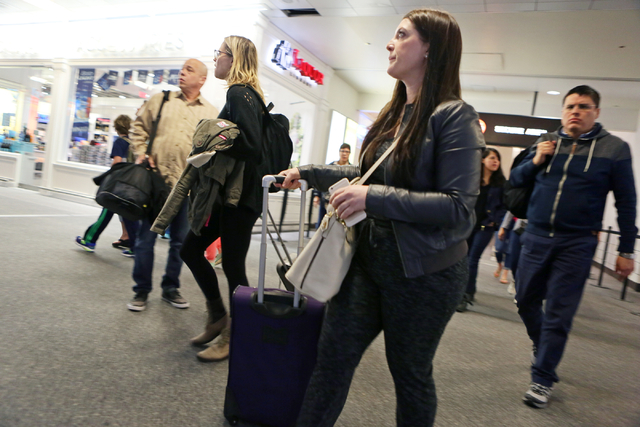 Passengers arrive at McCarran International Airport Terminal 1 Wednesday, March 23, 2016, in Las Vegas. Ronda Churchill/Las Vegas Review-Journal