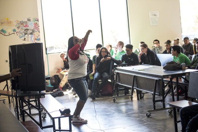 Elizabeth Elie, who goes by the name Lizzie G, performs at Quest Preparatory Academy March 17. Joshua Dahl/View