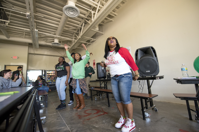 Elizabeth Elie, who goes by the name Lizzie G, performs at Quest Preparatory Academy March 17. Joshua Dahl/View