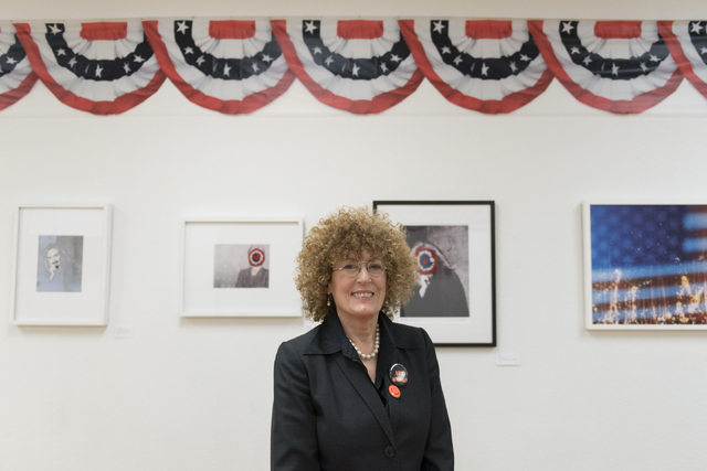 Artist and curator Diane Bush poses at the "MUG SHOTS #3" group show at Left of Center Art Gallery March 12. Jason Ogulnik/View