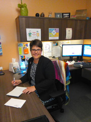 Diana Morgan, director of development at the Discovery Children's Museum, catches up on thank-you notes. Gina Rose DiGiovanna/Special to View