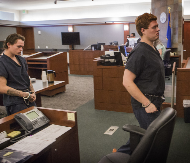 Defendants Erich Nowsch, left, and Derrick Andrews exit court after a hearing at the Regional Justice Center on Thursday, May 21,2014. Nowsch is accused in the Feb. 12 slaying of Tammy Meyers whil ...