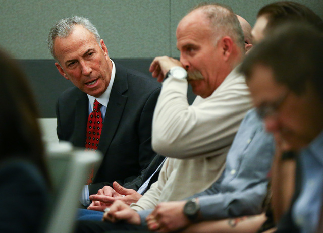 Clark County District Attorney Steve Wolfson, left, talks as Bob Meyers while Erich Nowsch, not pictured, pleads guilty to the murder of Tammy Meyers, wife of Bob Meyers, at Regional Justice Cente ...