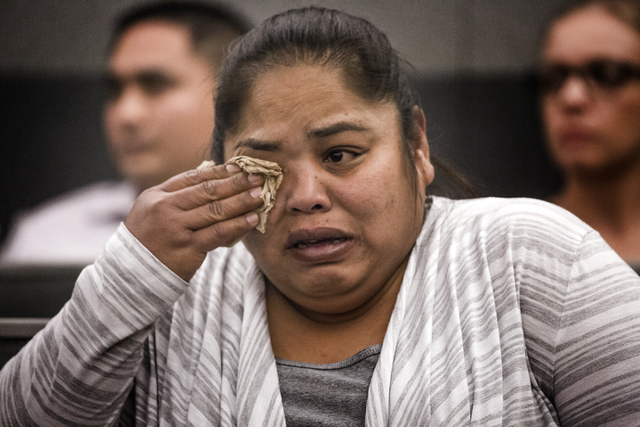 Melissa Sagiao, cries during sentencing of her sister Michelle Paet at Regional Justice Center on Thursday, March 3, 2016. Paet received life in prison for killing her husband  Nellis Airman Natha ...