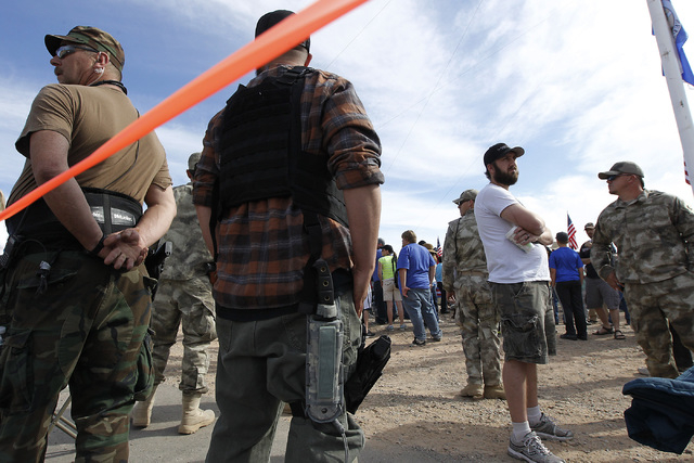 Armed supporters of the Bundy family gather outside of Bunkerville to challenge the BLM on April 12, 2014. (Jason Bean/Las Vegas Review-Journal)