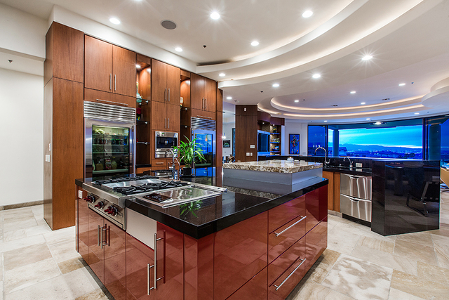 The kitchen is positioned to take in the views of the Las Vegas Valley. (COURTESY OF Shapiro & Sher Group)