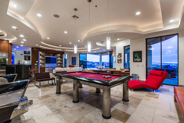 The game room has a pool table. (COURTESY OF Shapiro & Sher Group)