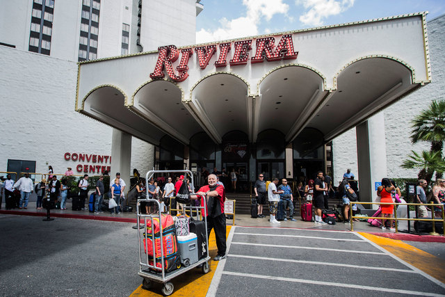 People wait for rides after checking out of the Riviera hotel-casino, 2901 Las Vegas Blvd. South,  on Monday, May 4, 2015. The casino closed Monday after 60 years on the Las Vegas Strip. (Jeff Sch ...
