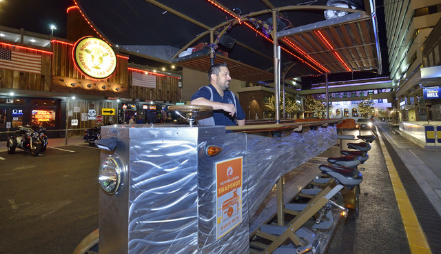 Ben Contorno, a driver for the Vegas Pub Crawler bicycle tour, waits for customers to show up at the Downtown Grand Las Vegas hotel-casino at 206 N. 3rd St. on Tuesday, March 8, 2016. Bill Hughes/ ...