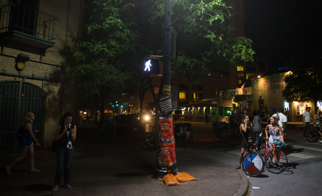 People walk along 6th Street during the first night of the SXSW music festival in downtown Austin, Texas on Tuesday, March 15, 2016. Chase Stevens/Las Vegas Review-Journal Follow @csstevensphoto