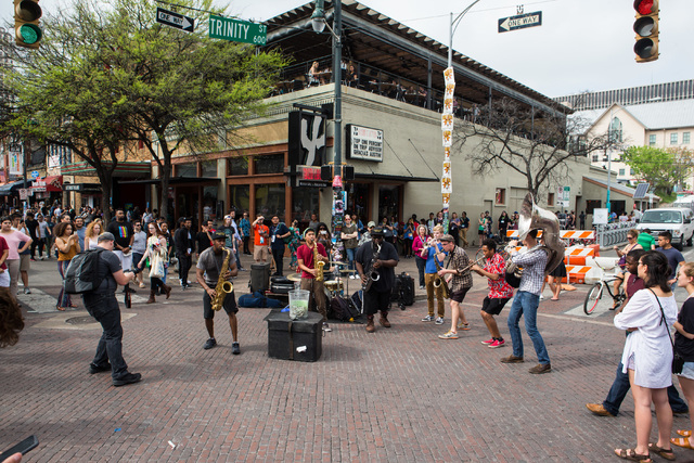Performers draw a crowd on 6th Street during the second day of the SXSW music festival in downtown Austin, Texas on Wednesday, March 16, 2016. Chase Stevens/Las Vegas Review-Journal Follow @csstev ...