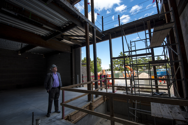 Clark County Commissioner Steve Sisolak looks at the inside of the new addition to the Thomas & Mack Center during the topping-off ceremony at UNLV in Las Vegas on Tuesday, March 22, 2016. Jos ...