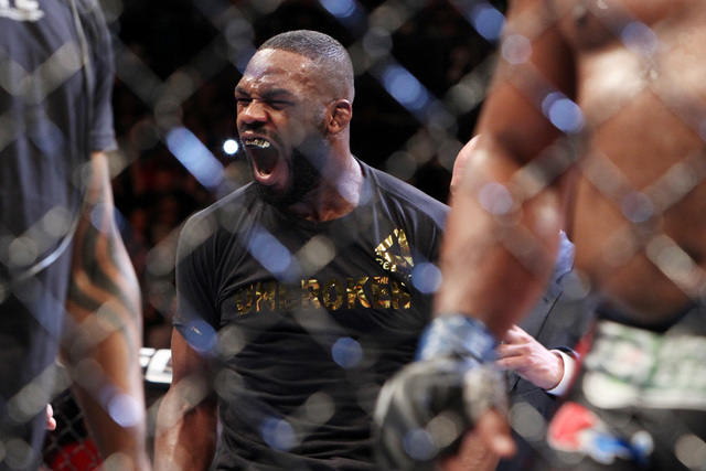 Jon Jones celebrates his victory over Daniel Cormier after their fight at UFC 182 Saturday, Jan. 3, 2015 at the MGM Grand Garden Arena. Jones won a unanimous decision. (Sam Morris/Las Vegas Review ...