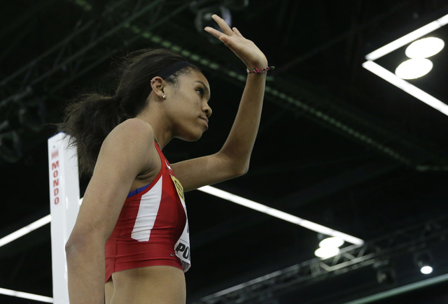 United States' Vashti Cunningham waves to the crowd after an attempt in the women's high jump final during the World Indoor Athletics Championships, Sunday, March 20, 2016, in Portland, Ore. Cunni ...