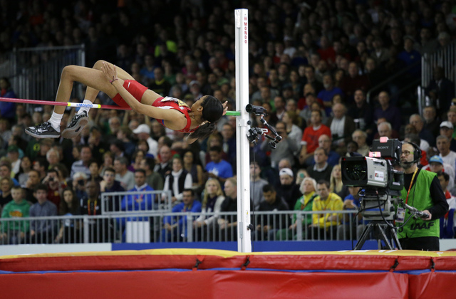 United States' Vashti Cunningham clears the bar during the women's high jump final during the World Indoor Athletics Championships, Sunday, March 20, 2016, in Portland, Ore. Cunningham won the eve ...