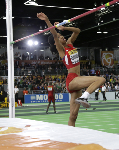 United States' Vashti Cunningham makes an attempt in the women's high jump final during the World Indoor Athletics Championships, Sunday, March 20, 2016, in Portland, Ore. Cunningham won the event ...