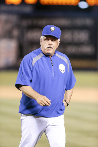 Las Vegas 51s manager Wally Backman walks back to the dugout after making a pitching change in the top of the ninth inning at a baseball game against the Salt Lake Bees at Cashman Field in Las Veg ...