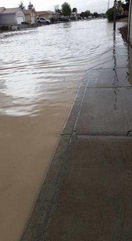 Flooding is shown on Colton Avenue near Cheyenne Avenue and Simmons Street on April 9, 2016. (Courtesy, Katherine DeSilva)