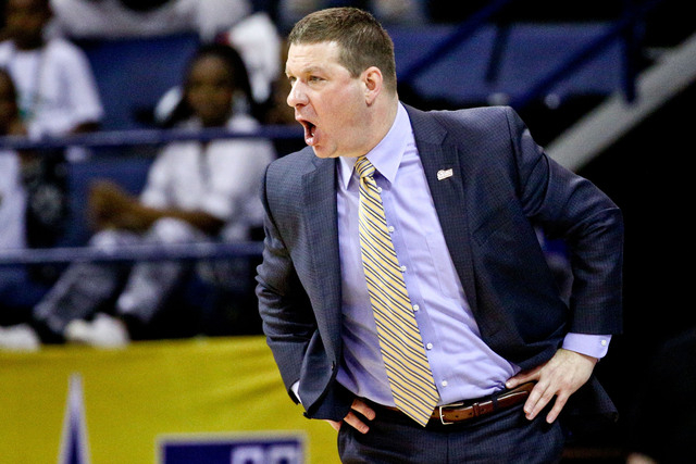 Arkansas Little Rock Trojans head coach Chris Beard yells from the sidelines against the Louisiana Monroe Warhawks during the first half of the Sun Belt Conference tournament championship game at ...