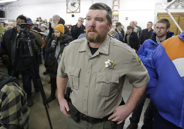 In this Jan. 6, 2016 file photo, Harney County Sheriff David Ward arrives at a community meeting at the Harney County fairgrounds in Burns, Ore. (Rick Bowmer, File/AP)