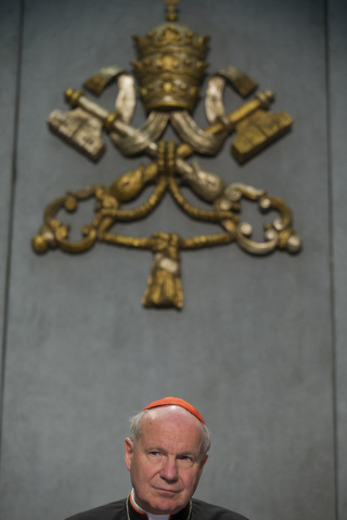 Cardinal Christoph Schoenborn attends a press conference at the Vatican, Friday, April 8, 2016. (Andrew Medichini/AP Photo)