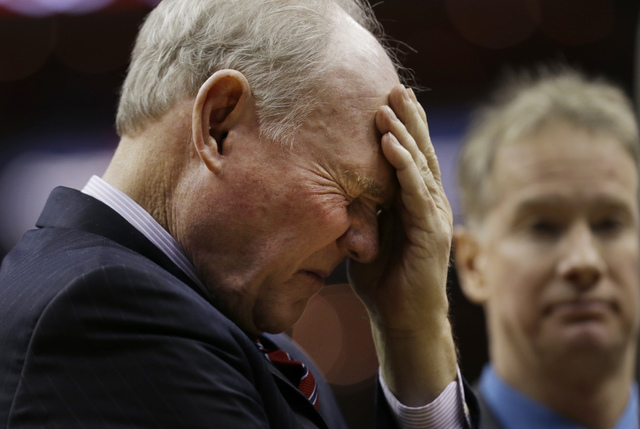 In this Dec. 21, 2015 file photo, Sacramento Kings coach George Karl pauses during a timeout during the first half of an NBA basketball game against the Washington Wizards, in Washington. (Carolyn ...
