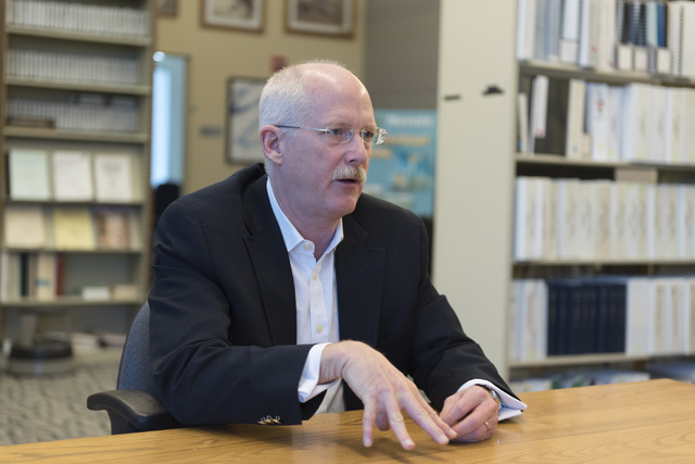 Ambassador Henry S. Ensher of the United States Mission to the International Organizations in Vienna speaks with a reporter at the National Atomic Testing Museum in Las Vegas Tuesday, April 5, 201 ...