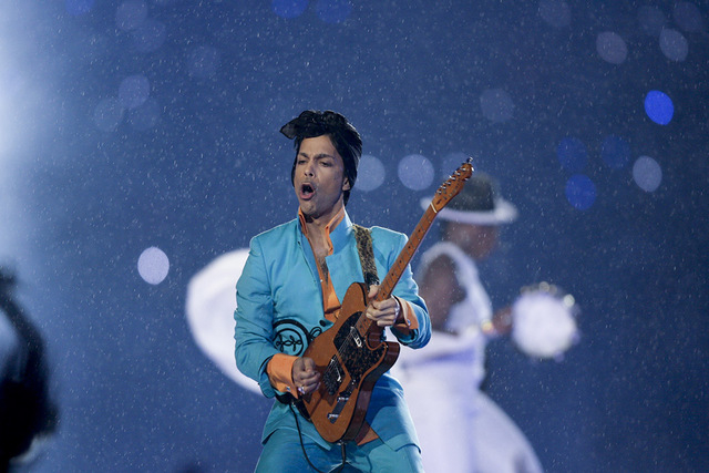 Prince performs during the halftime show at the Super Bowl XLI football game at Dolphin Stadium in Miami on Sunday, Feb. 4, 2007. ((Alex Brandon/AP)