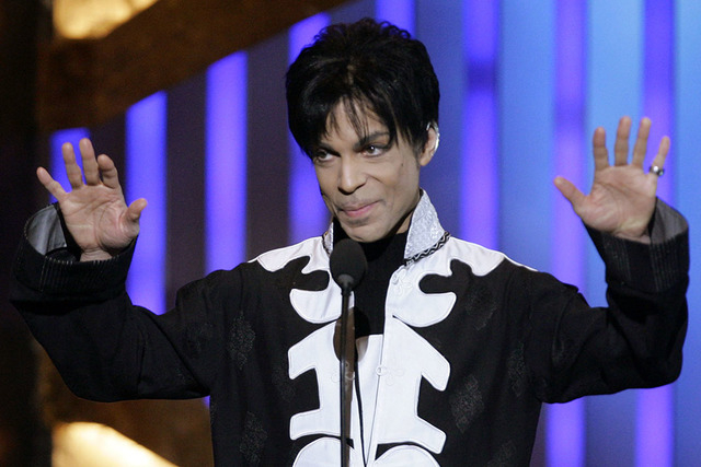 Prince accepts the award for outstanding male artist at the 38th NAACP Image Awards in this March 2, 2007 file photo, in Los Angeles.  (AP Photo/CHRIS CARLSON, file)