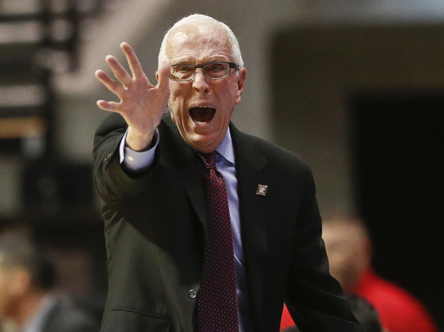 San Diego State coach Steve Fisher shouts instructions in the first half of a NIT opening round NCAA college basketball game against IPFW Tuesday, March 15, 2016, in San Diego. (AP Photo/Lenny Ign ...