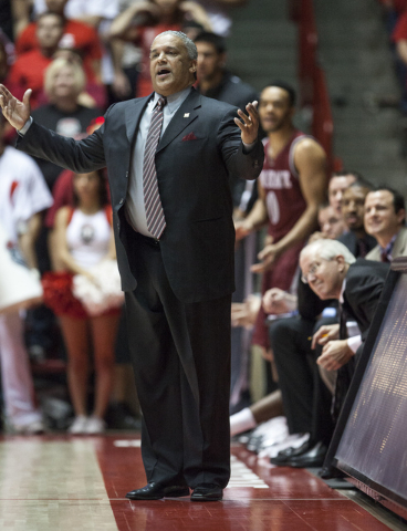 New Mexico State coach Marvin Menzies watches his team play New Mexico in the first half of an NCAA college basketball game Tuesday, Dec. 17, 2013, in Albuquerque, N.M.(AP Photo/Craig Fritz)