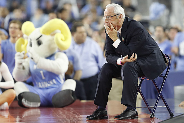 North Carolina head coach Roy Williams watches play against Villanova during the first half of the NCAA Final Four tournament college basketball championship game Monday, April 4, 2016, in Houston ...