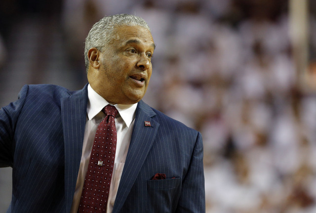 New Mexico State head coach Marvin Menzies watches from the sidelines during the first half of an NCAA college basketball game against New Mexico in Las Cruces, N.M., Sunday, Nov. 15, 2015.  (AP P ...