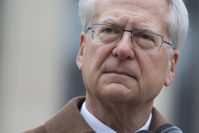 Lawyer Larry Klayman speaks to reporters outside the E. Barrett Prettyman Federal Courthouse, on Monday, Dec. 22, 2014, in Washington. (AP Photo/Evan Vucci)