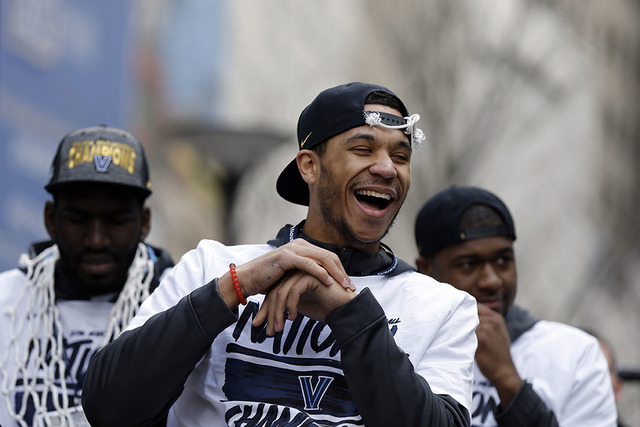 Villanova's Josh Hart smiles as he and his basketball teammates take part in a rally celebrating the team's NCAA college basketball championship, Friday, April 8, 2016, in Philadelphia. (AP Photo/ ...