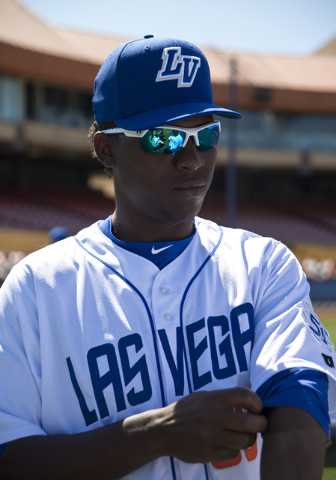 Rafael Montero (50) rolls up his sleeve during media day for the Las Vegas 51s at Cashman Field in Las Vegas on Tuesday, April 5, 2016. The event was held ahead of opening Thursday's season opener ...