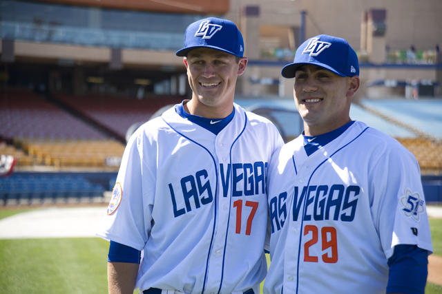 Las Vegas natives Paul Sewald (17), left, and Chasen Bradford (29) pose for photos during media day for the Las Vegas 51s at Cashman Field in Las Vegas on Tuesday, April 5, 2016. The event was hel ...