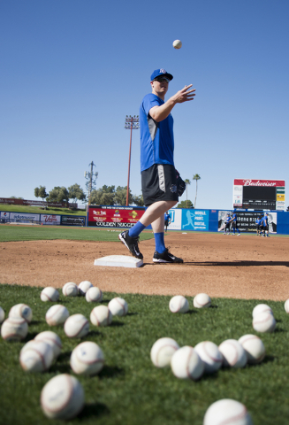 Marc Krauss (34) tosses a ball behind him during media day for the Las Vegas 51s at Cashman Field in Las Vegas on Tuesday, April 5, 2016. The event was held ahead of opening Thursday's season open ...