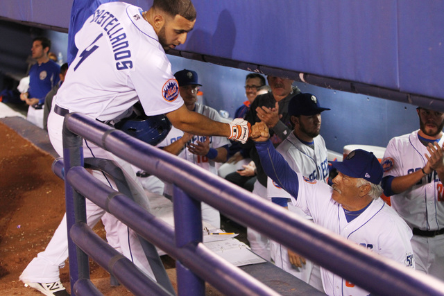 Las Vegas 51s Alex Castellanos is greeted by manager Wally Backman after Castellanos hit a two run homer against the Fresno Grizzlies during the 51s home opener Friday, April 17, 2015, at Cashman  ...