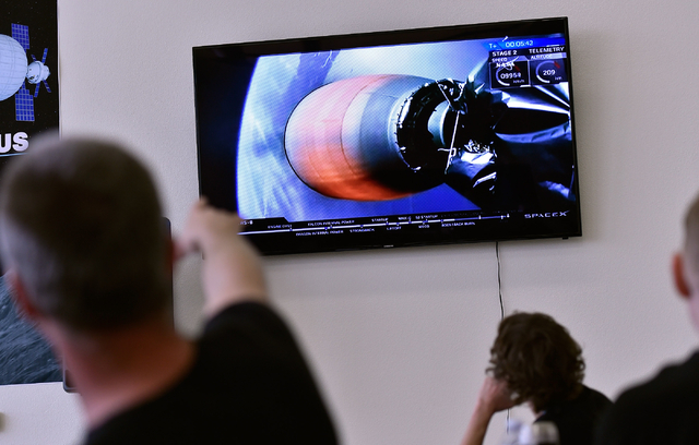 Employees watch the lift-off of the SpaceX rocket at Bigelow Aerospace Friday, April 8, 2016, in North Las Vegas. The Bigelow Expandable Activity Module, or BEAM, was built by Bigelow and included ...