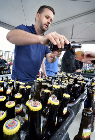 David Towill pours a beer at the Paulaner Brewing Company tent during the Great Vegas Festival of Beer in the 800 block of Fremont Street in Las Vegas on Saturday, April 9, 2016. Bill Hughes/Las V ...